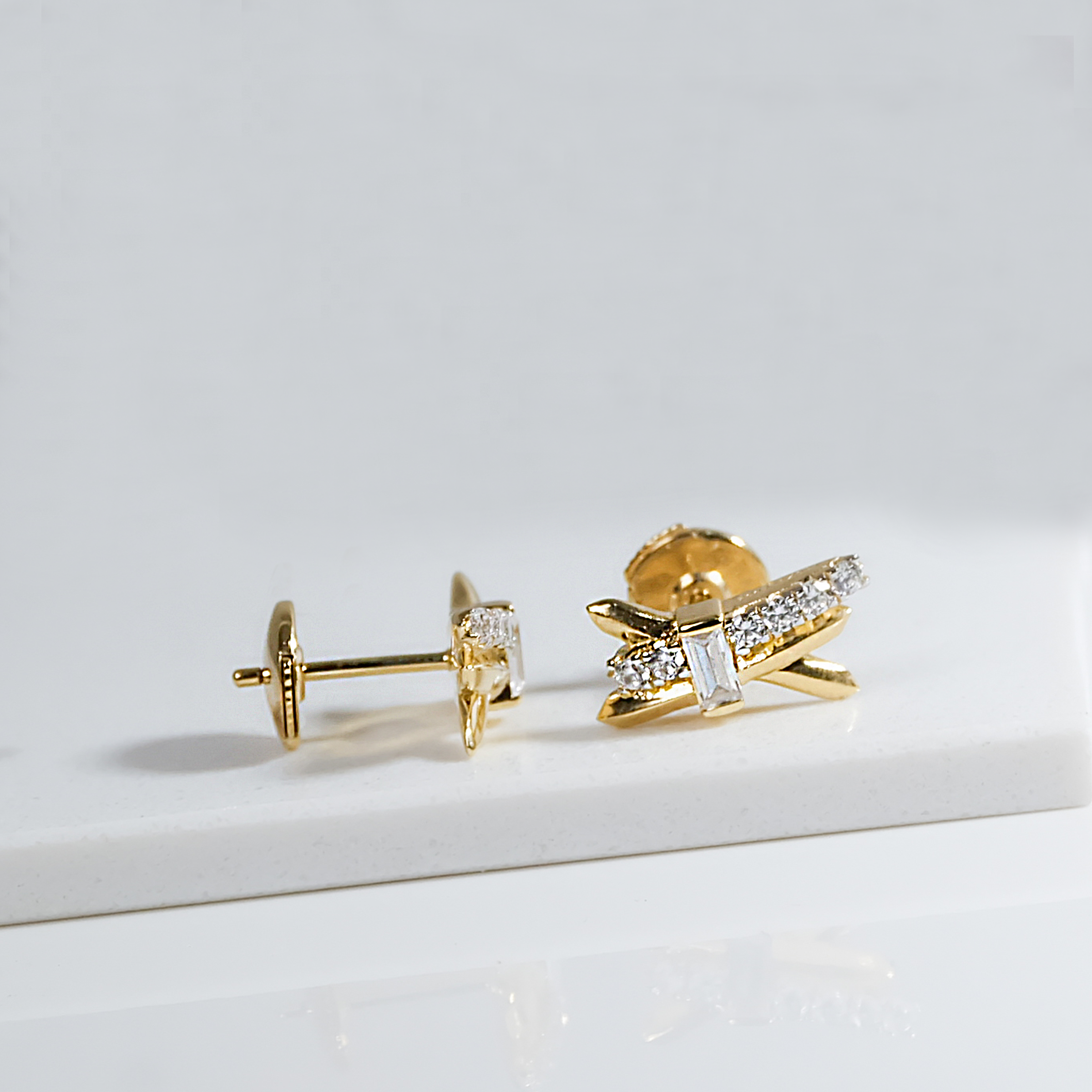 Radiant Cross Gold Studs